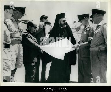 Feb. 25, 2012 - Archbishop Makarios and Mr. Amery visit boundaries of Bases in Cyprus. It was announced in Nicosia , Cyprus, last night that agreement had been reached on all major issues in the talks on the future of Cyprus. It was issued after a meeting between between Mr.Julian Amery. the Colonial Secretary, Archbishop Makerios, the Greek Cypriot, leader, Dr. Kutchuk, the Turkish Cypriot leader , and Sir Hugh Foot, the Governor . Today , Mr.Amery , Archbishop Makarios and others visited the Famagusta area to point out the boundaries of British bases. Photo shows Mr Stock Photo