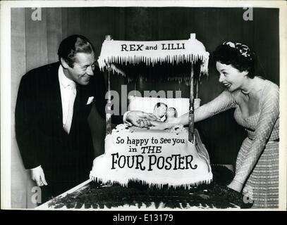 Feb. 26, 2012 - Rex Harrison and Lilli Palmer eye ''''Four Poster'' cake, baked for their tenth wedding anniversary party held at Hotel Pierre. Their latest picturex? a Columbia release named ''The Four poster' Stock Photo