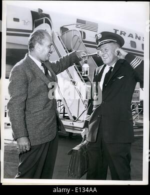 Feb. 28, 2012 - Idlewild Airport, N.Y., June 15--- blow the man down! actor Keeran Wynn puts air-horn to the ear of twa Captain Stock Photo