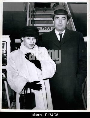 Feb. 28, 2012 - Idlewild Airport, N.Y., Dec 12 --Film star Gregory Peck and wife arrive TWA from Hollywood. The star is here for a series conferences regarding his Forthcomino Western, ''The Big Country' Stock Photo