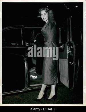 Feb. 28, 2012 - Idlewild Airport: Beauteous Rhonda Fleming was an arrival here last night VIA TWA from Los Angeles. She's in town for a television appearance, and for promotion work in connection with two RKO Pictures in which she stars, They are ''slightly Scarlet,'' and ''While The City Sleeps' Stock Photo