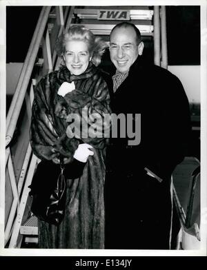 Feb. 28, 2012 - Idlewild Airport, N.y. Feb 14 Rosemary Clooney's valentine day gift from husband, Jose Ferrer, will be a week-end in Paris--- They're seen here on their arrival from los angels aboard a TWA super-g constellation, after a few hours in town they will return to the airport for the trip to Paris. Stock Photo