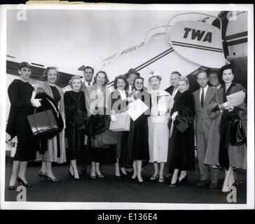 Feb. 28, 2012 - Los Angeles Airport, Calif Feb 26 -- the Hollywood contingent to the Uruguayan ILM Festival is shown before boarding a TWA Flight here today for New York Girls, (Left to right) AFE: Joanne Gilbert, Virginia, Elmore, Beverly Tyler, Alexis Smith, Mrs.Van Heflin, Joanne Del, Hedda Hopper, Lana Turner and Ann Miller. Between Miss Turner and Miss Miller is Paul De Smandek, Brazilian Consul, who has three to see the group's departure. The movie people will also in visit Brazil and Argentina.Anita Ekberg, who was also aboard the flight, is not in the picture. Stock Photo