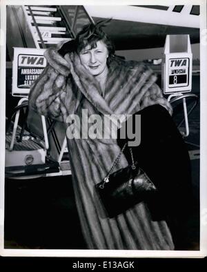 Feb. 29, 2012 - Idlewild airport, N.Y., Jan 2nd -- actress Judith Anderson battles the winds at the airport on her arrival from Stock Photo