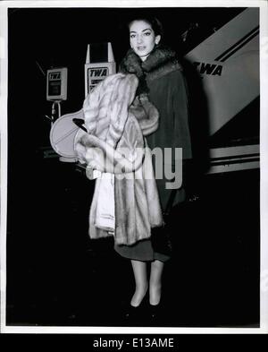 Feb. 29, 2012 - Idlewild Airport, N.Y., Nov. 10 -- Opera Star Maria Callas, an early-morning arrival, is well equipped to handle our cool weather as seen here after flying in via TWA from Paris. She will be leaving soon for Dallas, Texas, where she will fulfill a singing engagement. Stock Photo