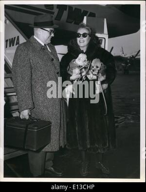 Feb. 29, 2012 - Movies Star Joan Crawford, her husband, Al Steele, President Pepsi-Cola, and two poodles arrived in town for a short visit aboard a TWA Jestream flight from Los Angeles. Stock Photo