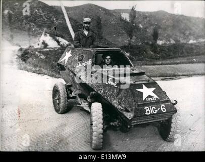 Mar. 22, 2012 - Russian made armoured car captured by United Nations forces in Korea: CPL. Harvey stoner of Plainville, Kansas 6132nd. Tactical Control Group (driving) and CPL, Wilner Dungelman of Bridgeport, Comn. 21st. Infantry Regiment, 24th. Infantry Division (standing) -ride in a captured Russian made BA64, light armoured car, in Korea. Stock Photo