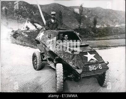 Mar. 22, 2012 - Russian made armoured car captured by United Nations forces in Korea: Cpl. Harvey Stoner of Plainville, Kansas  Tactical Control Group (Driving) and Cpl. Wilmer Dungelman of Bridgeport, Co, 21st Infantry Regiment, 24th. Infantry Division (Standing) ride in a captured Russian made SA64 light armoured car in Korea. Stock Photo