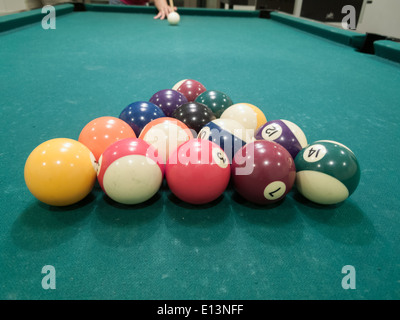Snooker player taking first shot Stock Photo