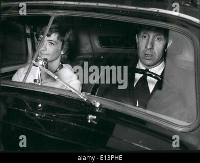 Mar. 22, 2012 - Francoise Sagan Weds Francoise Sagan, the famous French girl novelist, author of the best-seller ''Bonjour Tristesse'' married M. Guy Schoeller, of the Hachette Newspaper Distributing Company, in Paris. OPS:- The couple in their car after the civil wedding. Stock Photo