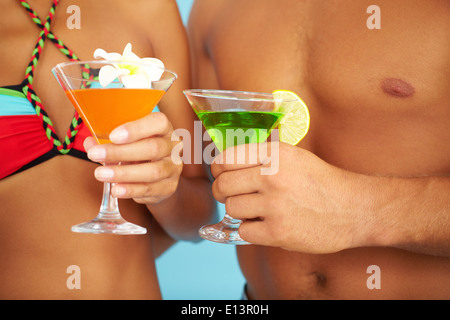 Close-up of cocktails in human hands Stock Photo