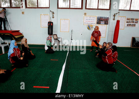 DEIR Al-BAlAH, PALESTINE - MAY 21: Disabled Palestinian volleyball of Women's a participates in Exercise a in Club Deir al-Balah in the central Gaza Strip on May 21, 2014. (Photo by Abed Rahim Khatib /Pacific Press) Stock Photo