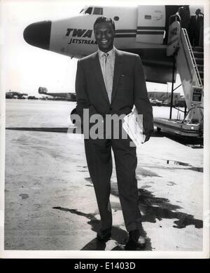 Mar. 31, 2012 - Idlewild Airport, N.Y., Aug. 29 - Singing Star Nat King Cole Boards TWA Ambassador Flight For Los Angeles. He Will Do TV Shows, And Appear In The Movie ''The St. Lous Blues,'' The W.C. Handy Story. Stock Photo