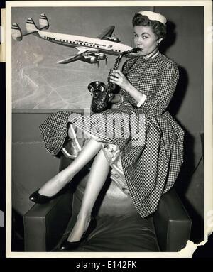 Mar. 31, 2012 - Idlewild Airport, N.Y. - Ann Crowley, Broadway and TV Singer, Toots her own horn as she waits to board a trans world airlines constellation for London. She is En route to South Africa, for a five week tour with Danny Kaye. Stock Photo