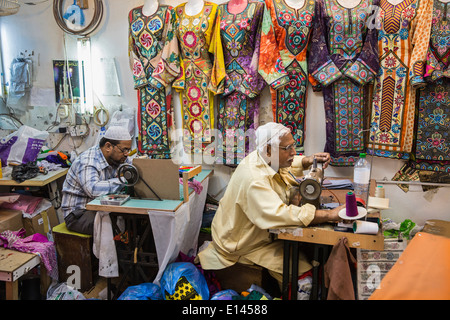 Oman, Muscat, Mutrah old city center and soukh. Tailors Stock Photo