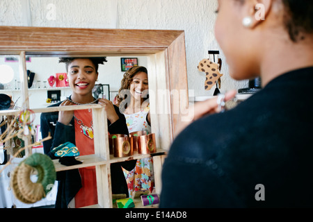 Women shopping together in store Stock Photo