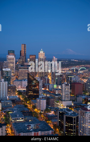 Aerial view of Seattle skyline lit up at night, Washington, United States Stock Photo