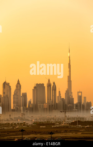 United Arab Emirates, Dubai, Financial city center skyline with Burj Khalifa, the highest building in the world. Sunrise Stock Photo
