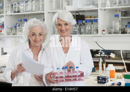 Senior Caucasian scientists working in lab Stock Photo