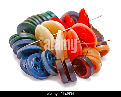 Buttons with a needle on a white background isolated Stock Photo