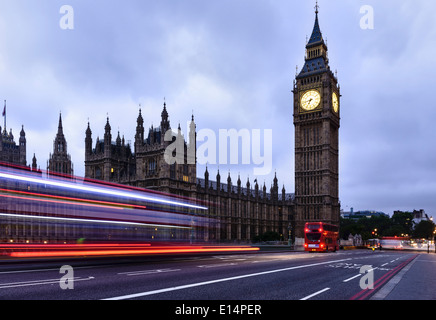 Time lapse view of bus passing Houses of Parliament, London, United Kingdom Stock Photo