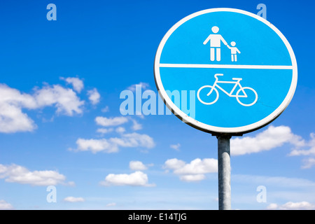 Bicycle and pedestrian shared route sign on the sky background Stock Photo