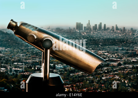 Chrome telescope with Downtown Los Angeles in background