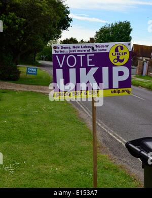 UKIP or Not.? Pre European Elections on the 24 May -  two signs  outside residential  area in West Wittering  showing amusing  views and comment for split opinions  of the householders, Stock Photo