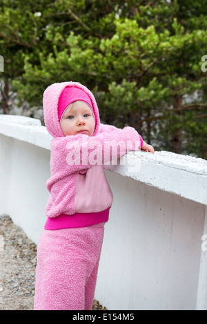 Little cute child girl on nature. Use it for baby, parenting or love concept Stock Photo