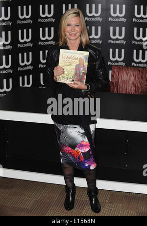 London, UK, UK. 19th Apr, 2012. Olivia Newton-John signs copies of her new cookbook, Livwise: Easy Recipes For A Healthy, Happy Life at Waterstones © Ferdaus Shamim/ZUMA Wire/ZUMAPRESS.com/Alamy Live News Stock Photo