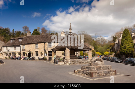 Castle Combe market Cross or Butter cross, Wiltshire, UK. Bright sun Stock Photo