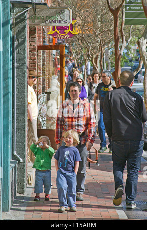 Asheville, North Carolina, USA - April 25, 2014: Tourists crowd the city streets of Asheville during the annual Moog Festival Stock Photo