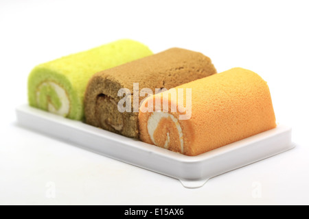 chocolate orange and pandanus leaf cake roll isolated on white background Stock Photo