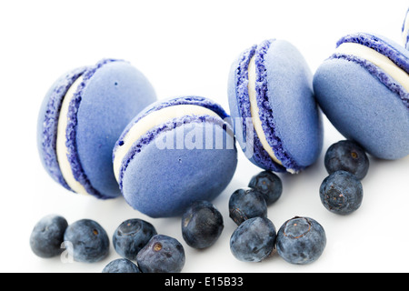 Gourmet small colorful French macarons with blueberry flavor. Stock Photo