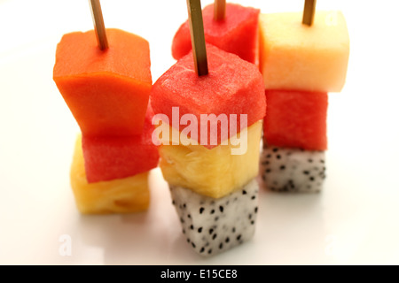 Platter of fruit skewers with a dish Healthy party food Stock Photo