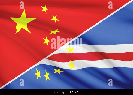 Flags of China and Republic of Cape Verde blowing in the wind. Part of a series. Stock Photo