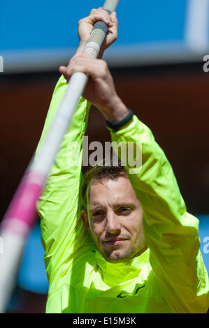 Zurich, Switzerland. 23rd May, 2014. Renaud Lavillenie (FRA), pole vaulting Olympic gold medalist is posing with a pole during a training session at the Letzigrund stadium in Zurich, Switzerland. Credit:  Erik Tham/Alamy Live News Stock Photo