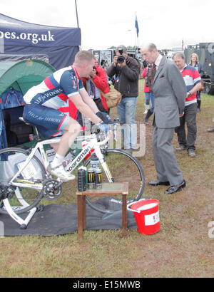 Exeter, Devon, UK. 23rd May, 2014. HRH the Duke of Kent meets Adam Greenford formerly with RAF 10.5yrs service riding 100miles per day raising funds for Help for Heroes and training for the Hero  Ride when 2000 participants converge on London  on June 8 2014 having completed sponsored rides from all over the country. Credit:  Anthony Collins/Alamy Live News Stock Photo