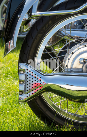Fishtail exhaust pipe on a vintage britsh motorcycle Stock Photo