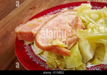 Bacon and cabbage - dish traditionally associated with Ireland. back bacon boiled with cabbage and potatoes. Stock Photo