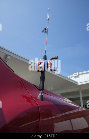Fishing pole car antenna mounted on a pickup truck Stock Photo - Alamy