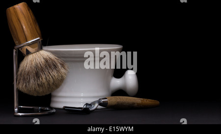 Shaving Tool on wooden Table and black Background Stock Photo