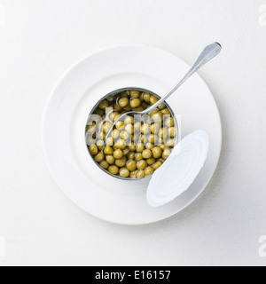 Canned green peas in tin can Stock Photo