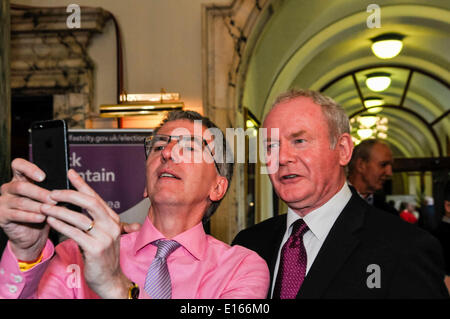 Belfast, Northern Ireland. 23 May 2014 - Lord Mayor of Belfast, Máirtín Ó Muilleoir, takes a 'selfie' with Martin McGuinness (both Sinn Fein) inside Belfast City Hall Credit:  Stephen Barnes/Alamy Live News Stock Photo