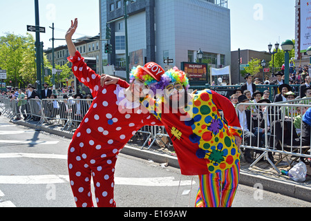 Religious Jewish men dressed as clowns at the Lag B'Omer parade in ...