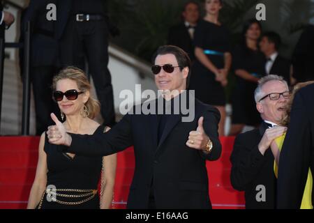 Cannes, France. 23rd May, 2014. US actor John Travolta and wife Kelly Preston attend the premiere of 'Sils Maria' during the 67th Cannes International Film Festival at Palais des Festivals in Cannes, France, on 23 May 2014. Photo: Hubert Boesl-NO WIRE SERVICE- Credit:  dpa picture alliance/Alamy Live News Stock Photo