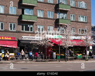 Carl Berners plass in Oslo Norway, old square modernized with new shops and flowering cherry trees in  springtime Stock Photo