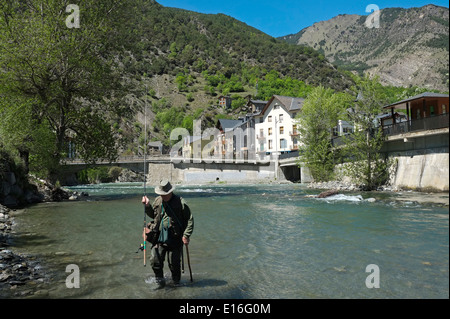 Angler fisherman at Llavorsi village located along river Noguera Pallaresa in province of Lleida  Catalonia Spain Stock Photo
