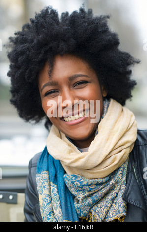 Portrait of young woman smiling, Milano, Italy Stock Photo