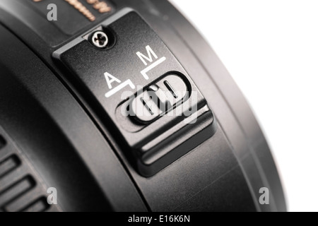 Detail of the auto focus switch on a photo lenses. Stock Photo
